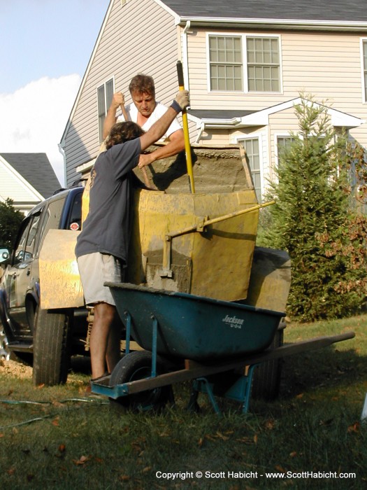 Instead of mixing it by hand, I bought 3/4 of a yard of premixed cement.