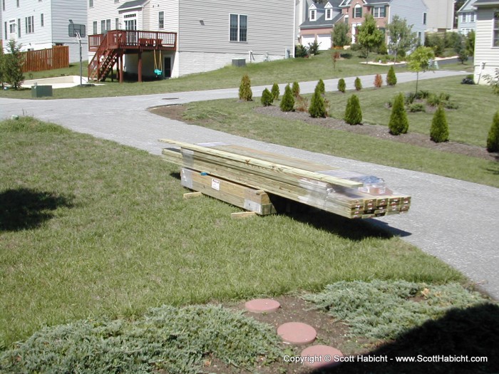 I had the wood delivered for the frame, but they couldn't get it around back, so I had to carry it there by hand.