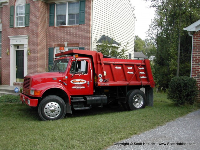 The guy delivering the gravel said, "I've gotten bigger things into smaller places."