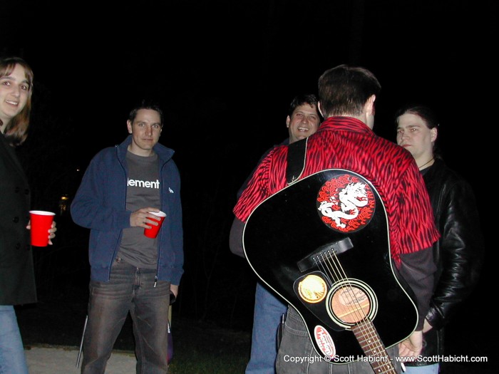 Did he buy the guitar to match the shirt, or the other way around?