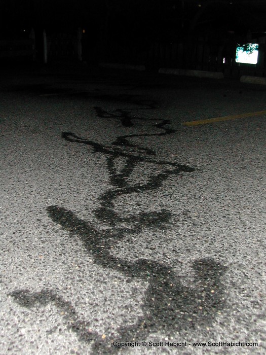 Mathew tries to write his name with a bottle of water. Now let me tell you about a bridge in Brooklyn I own.