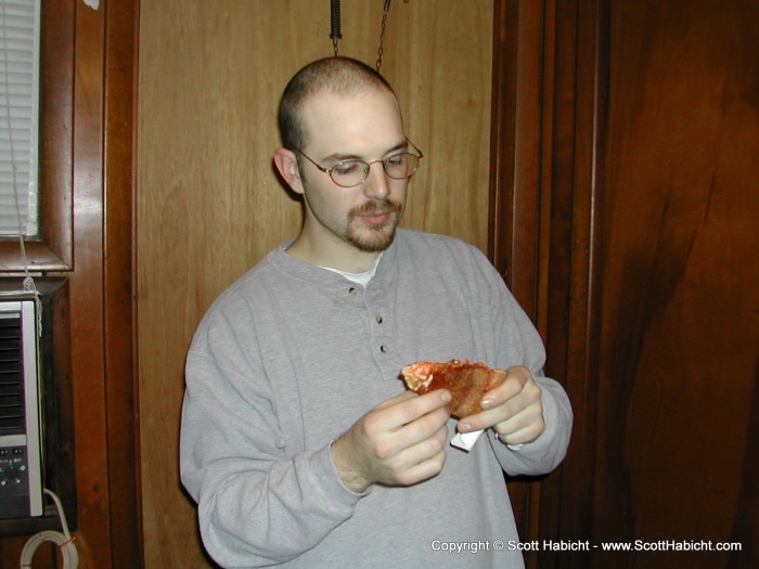 After a quick cleanup, Mathew was more than happy to eat the pizza.