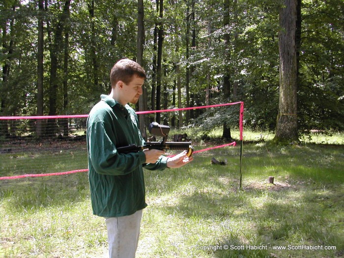 Drew's brother Paul makes sure the guns aren't shooting to fast.