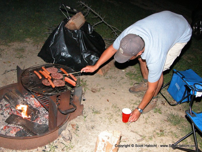 While everyone was getting setup, Steward was trying to flip the burgers with a chop stick...