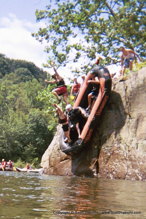 Not wanting to be out-done, Matt, Jason, Don, and Matt took our raft and slid off the rock.