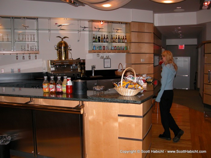 Kelli inspects the goods in the "Top Class" lounge at BWI airport.