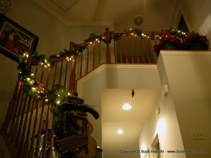 And why is the railing decorated and mistletoe hanging....