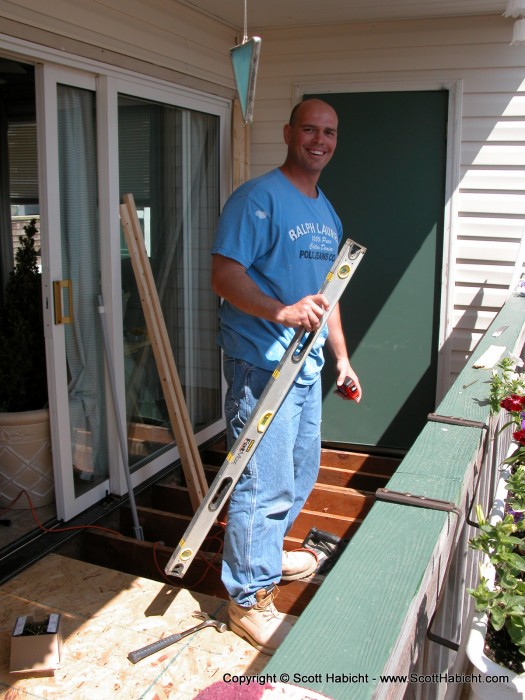 My neighbor Tom replaces his deck....