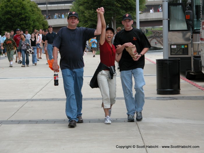 Jenny is happy to have two men.