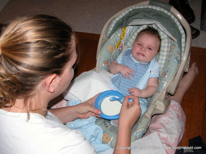 Taylor's first non-breast milk feeding. He like any man, wants boobs.