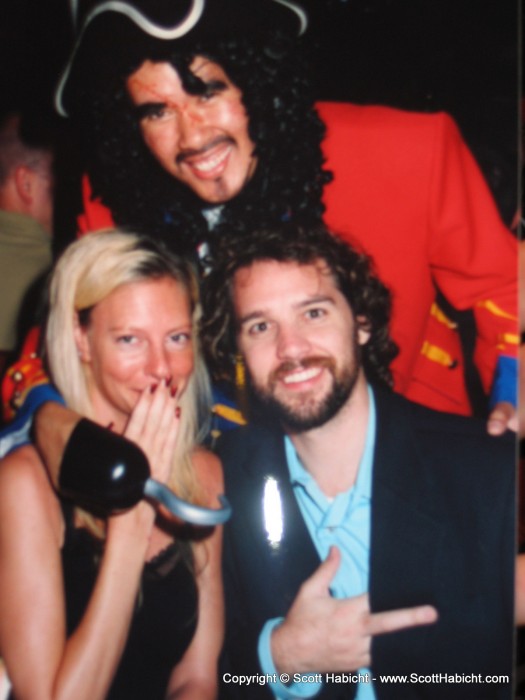 This is a picture of a picture taken by the cruise ship at dinner. Make me pose with a dumb pirate, and that's what you get.