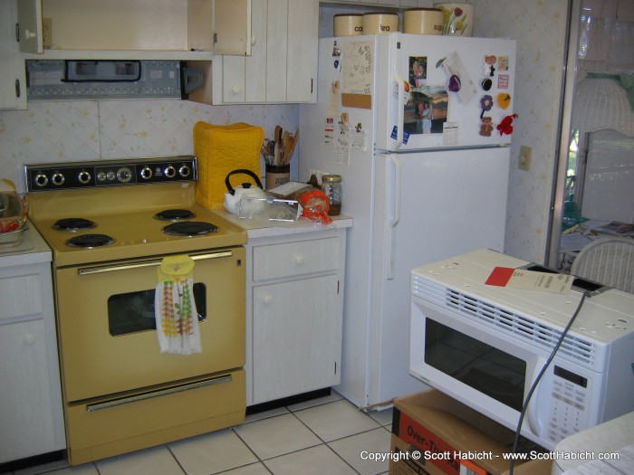 Back at her grandmother's house, and I was put to work replacing a microwave.