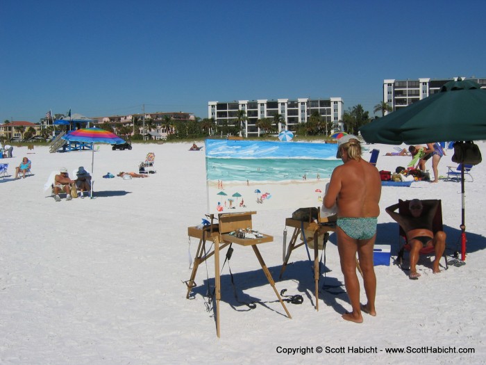 Local artist Gary Ritzenhein paints the beach.