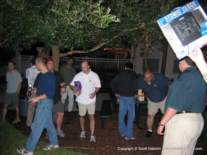 At the BBQ the first night, and Scott Trumpower shows off the clock he got.