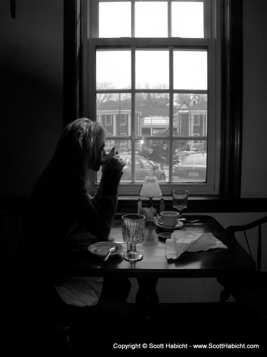 The next morning at breakfast, and Kelli enjoys a cup of coffee before we head out for the day.