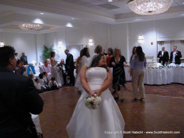 Followed by the tossing of the bouquet.