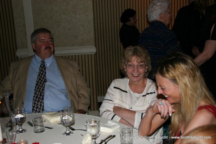 Uncle Ted, Aunt Ellen, and Kelli laugh about something.