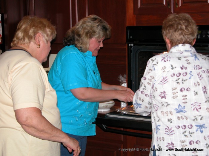 Would you expect the women in this family to be anywhere but the kitchen?