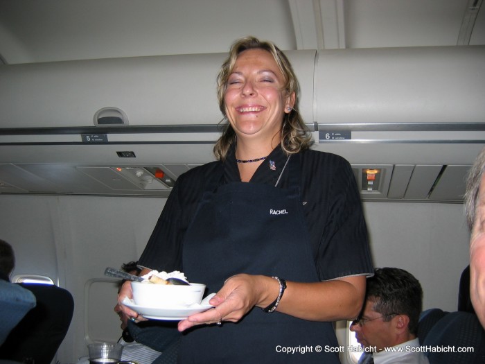 The stewardess served ice cream sundaes for dessert.