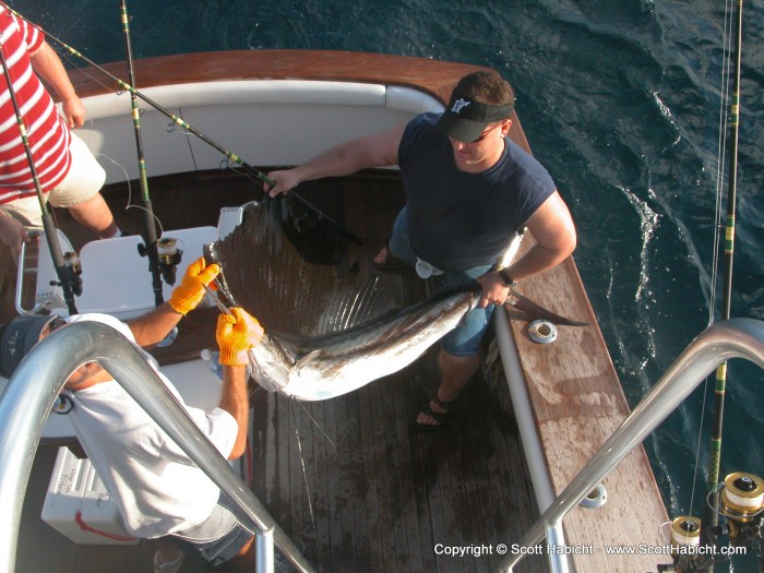 The other boat was a different story. As a note, Tim, the catcher of this fish almost broke rule #5, but went overboard instead. (photo: Eric Matthys)