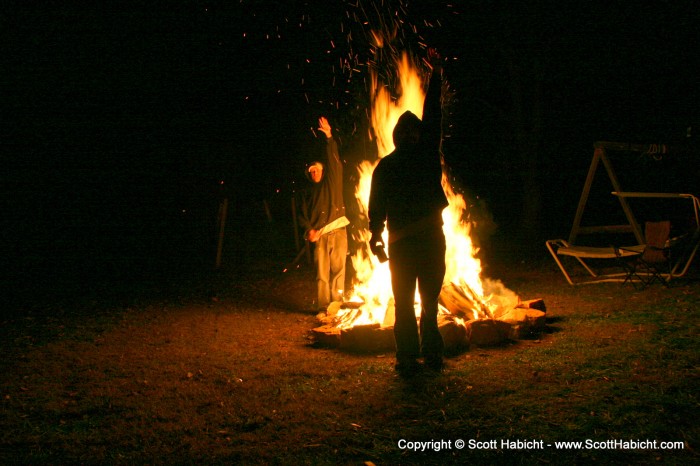 Draw a line between their hands to get the height of the fire.