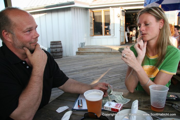 Some bluffing poker game they play with the serial numbers in dollar bills.