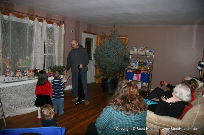 He is continuing my parent's tradition of bringing in a live tree on Christmas Eve.