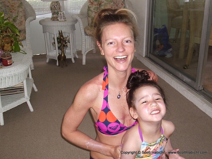 The next day we played it safe and went to the pool. Check out the matching hairdos, natch.