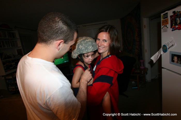 Zach gave Ashley his Army helmet, but she was still scared of the firework blasts.