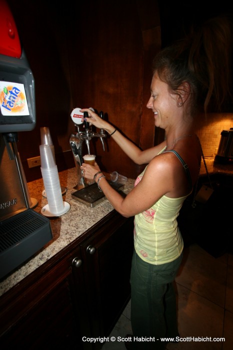 Kelli helps herself to the free Red Stripe tap in the lounge.