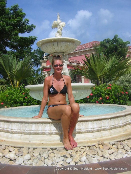 Posing at a fountain.