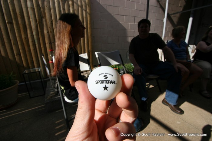 The rooftop deck next door was playing beer pong. Balls kept flying down on us.