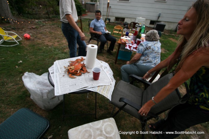 Kelli eyes up the crabs he brought.