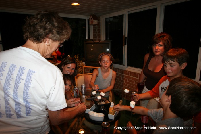 Toasting marshmallows on the porch.