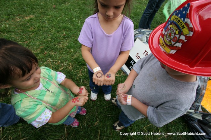 The kids show off their tattoos.