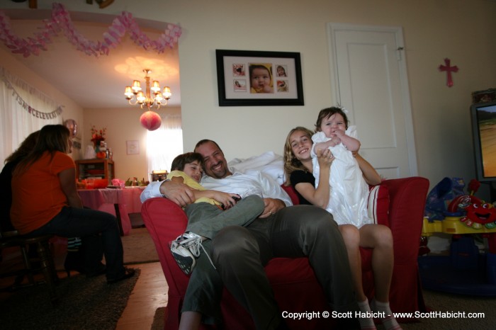 Afterwards they had a luncheon at their house. This is her sister's husband and kids.