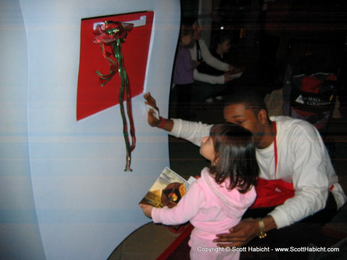 She put it in the mailbox for Santa but did not want to see him or sit in his lap.