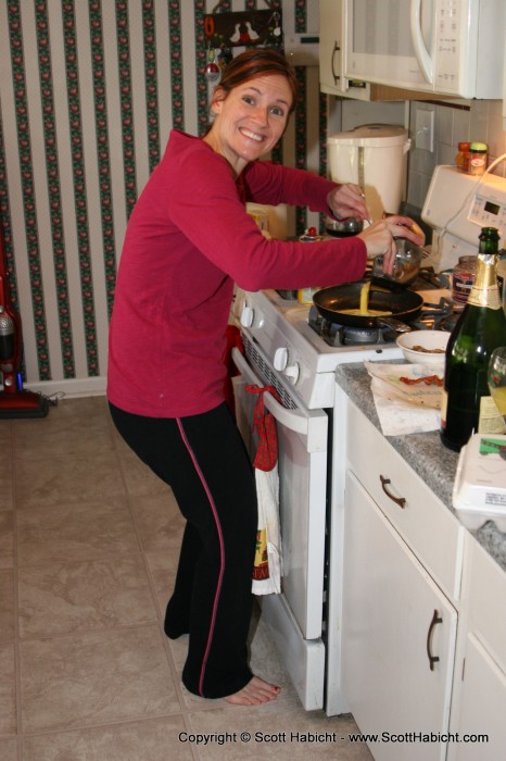 After gifts we put Kristi to work on breakfast.