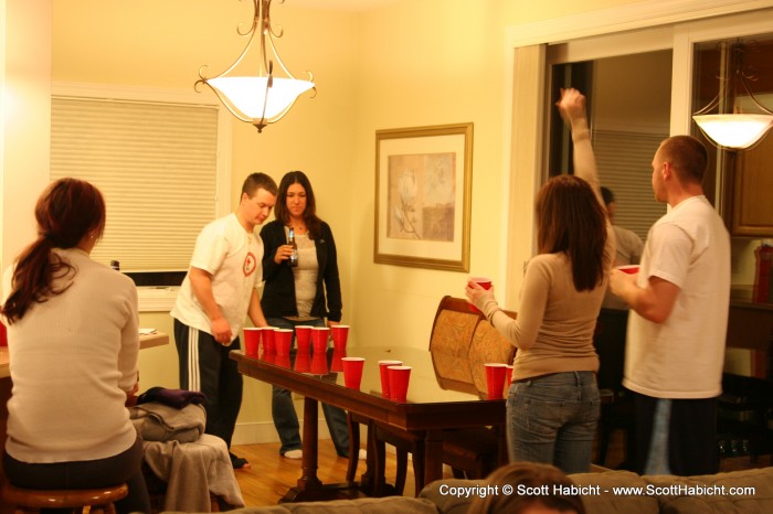 To find an intense game of beer pong going on.