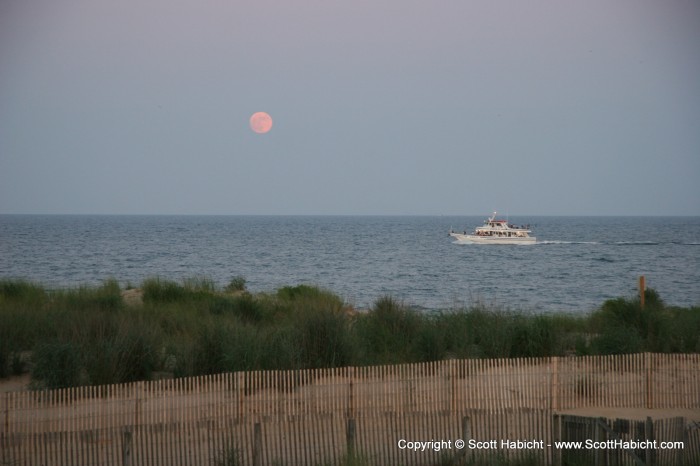 A nice moonrise catches the sunset glow.