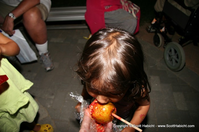 Sophia thought candy on an apple was a great idea.