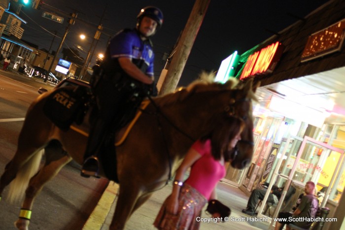 The police officer was not the subject of the picture, and the focus wasn't co-operating.