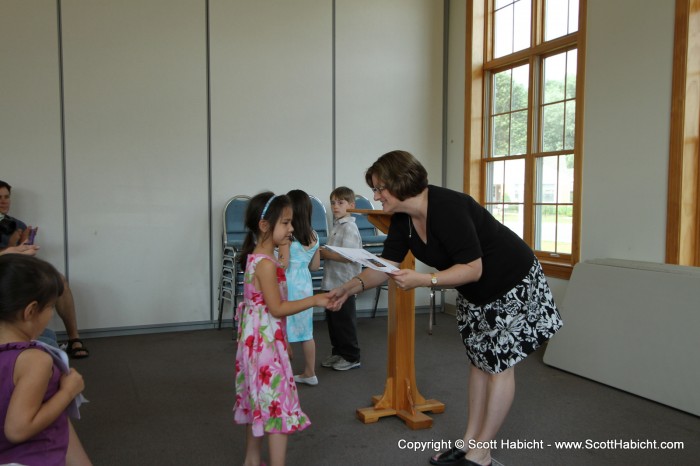 Afterwards Cathy gave her a certificate of accomplishment.