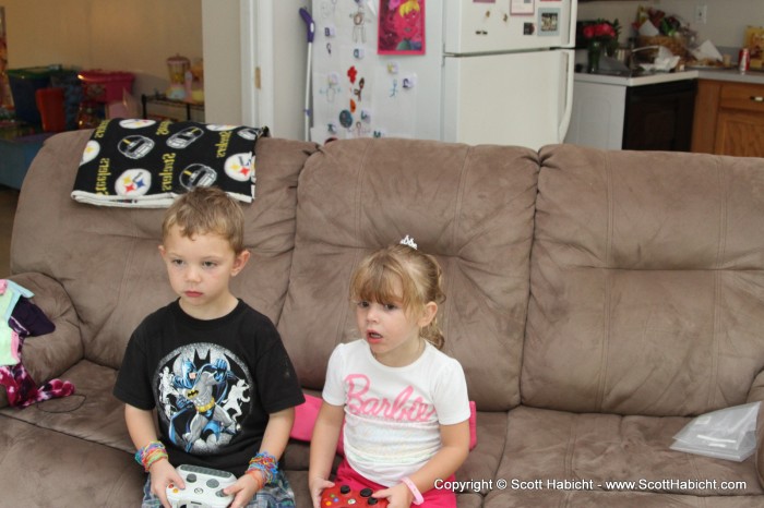 Taylor was showing Amber how to play the Xbox 360.