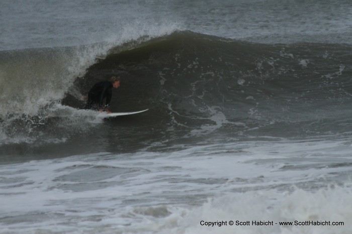 Check out how he's dragging his hand on the wave.