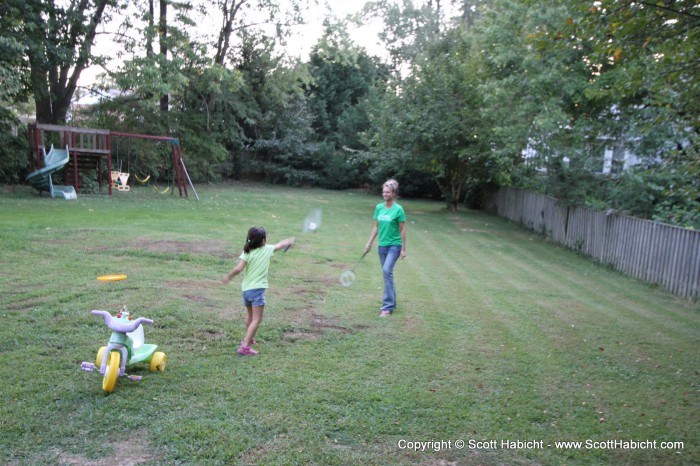 Ashley and Kelli enjoy a game of badminton.