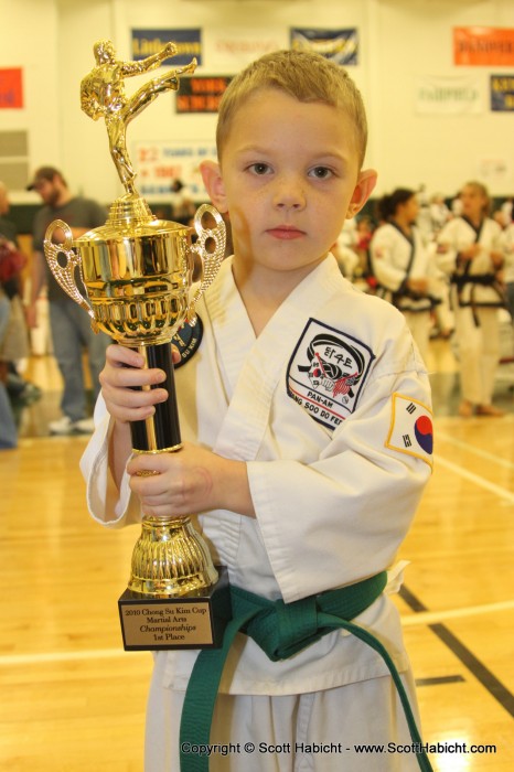 His first of 2 trophies that day.