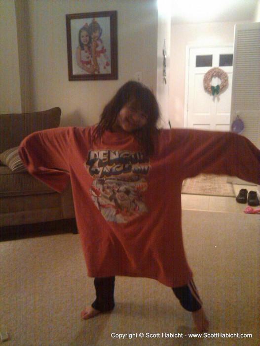 Sophia tries on my shirt, and it seems a tad too big for her.