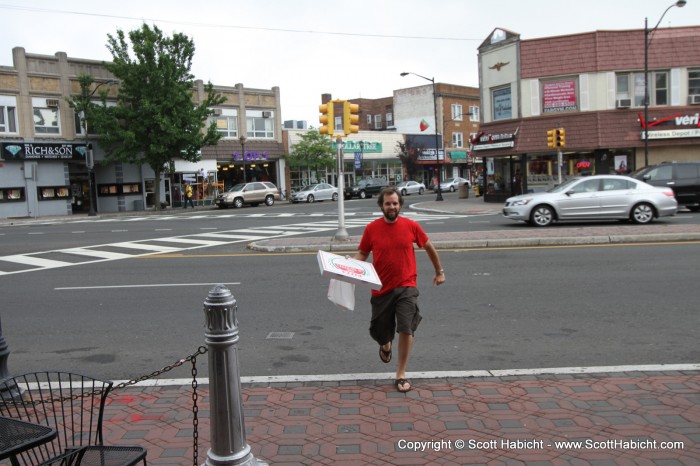 They didn't serve food, so I ran across the street and got a pizza pie.