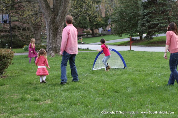 Outside the kids played with her new soccer goal.